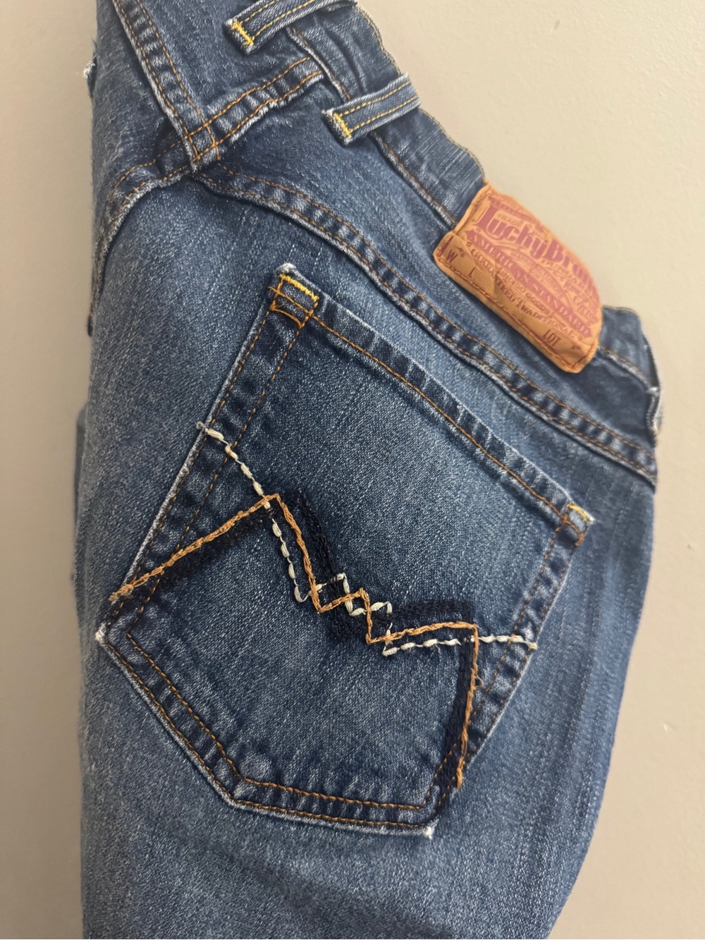 Lucky Brand Dark Blue Boot Cut Jeans with Tan Stitching